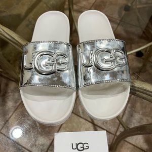 Fur lined silver and white UGG slides